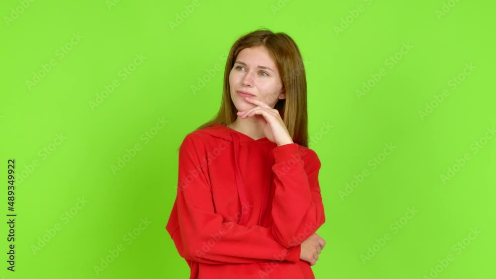 Young woman standing and thinking an idea pointing the finger up over isolated background. Green screen chroma key Young woman standing and thinking an idea pointing the finger up over isolated background. Green screen chroma key
