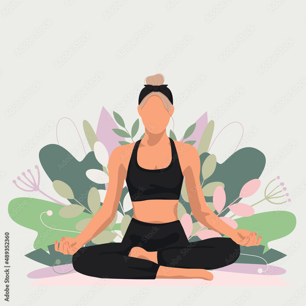 a blonde girl doing yoga sits in a lotus position in a black suit against the background of plants