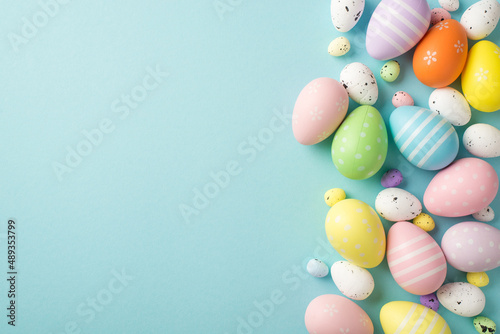 Photography Top view photo of easter decorations multicolored easter eggs on isolated pastel