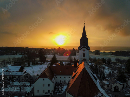 Church at sunset in winter  photographed by a drone