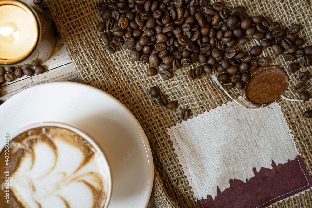 Coffee beans roasted on grunge wooden background