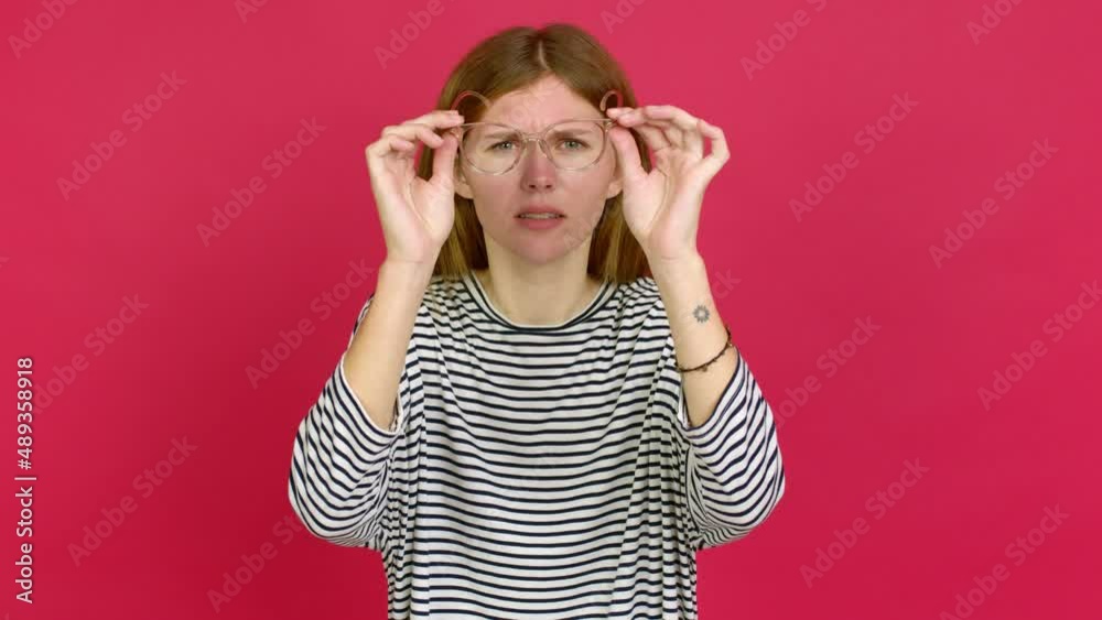Young woman with glasses and surprised Young woman with glasses and surprised