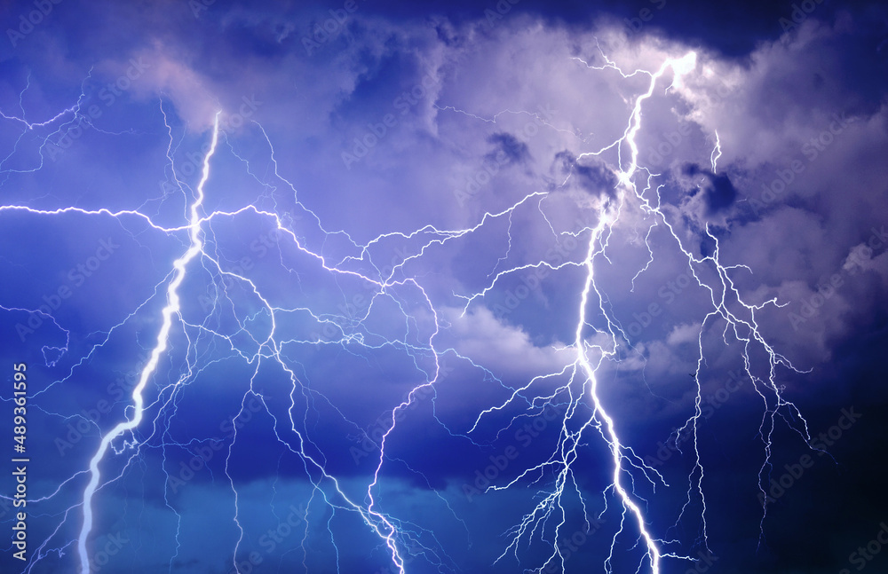 Fototapeta premium Lightning, thunder and rain during summer storm at night.