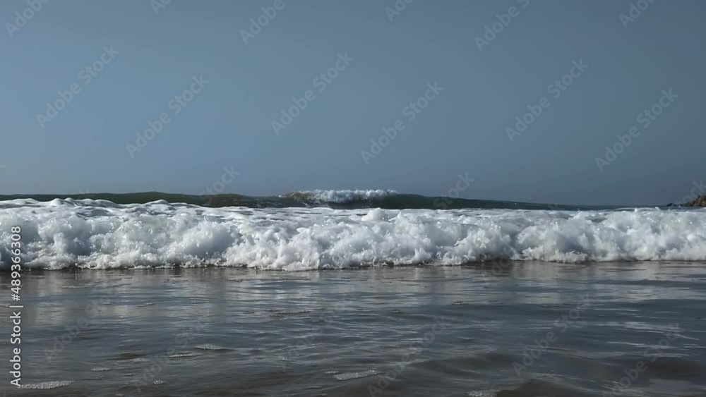 Slow motion shot of a wave rolling towards the camera. Slow motion shot of a wave rolling towards the camera.
