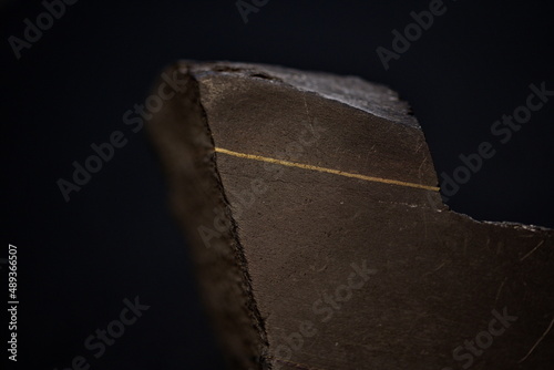 Angeschliffenes Kupferschiefer-Handstück aus dem Mansfelder Land photo