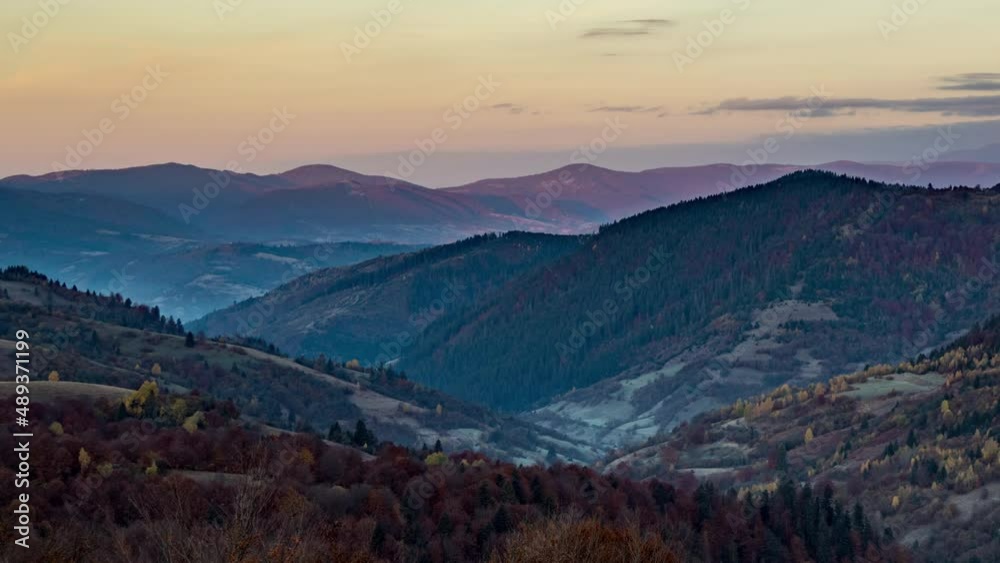 Sunrise illuminates forestry mountains in highland in autumn Sunrise illuminates forestry mountains in highland in autumn
