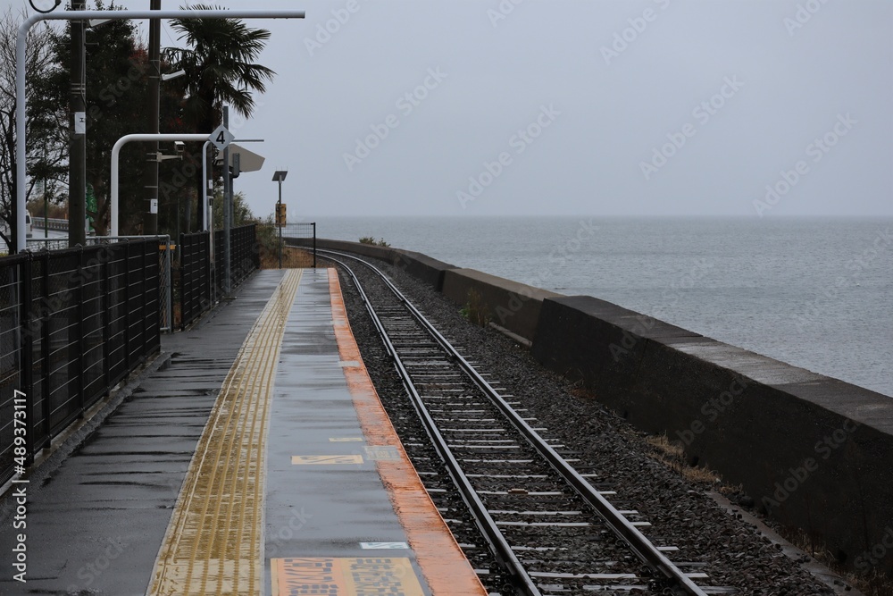 A railway along the sea on the Omura Line in Nagasaki Prefecture, Japan