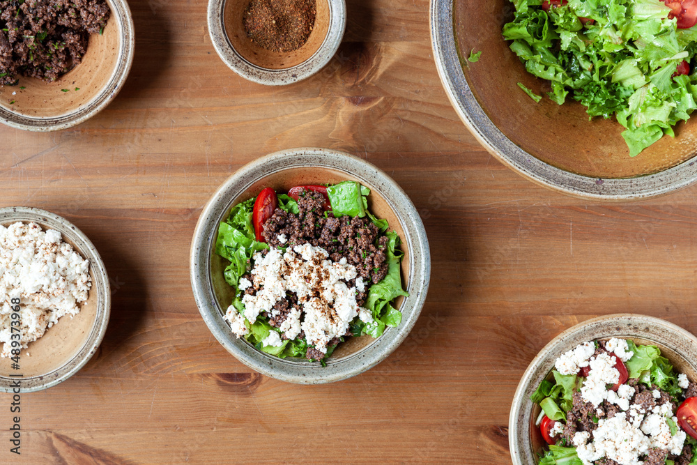 Fresh salad with whole grain teff, cheese and mitmita spice blend. Ethiopian cuisine. Fresh salad with whole grain teff, cheese and mitmita spice blend. Ethiopian cuisine.
