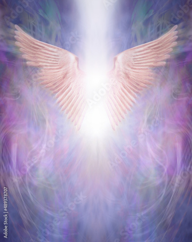 Blur motion Rising Angel Wings background - purple blue pink symmetrical wispy background with shaft of white light and angel wings with copy space below 