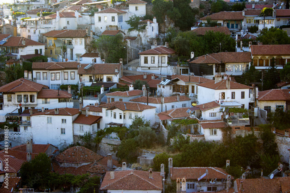 Obraz premium Muğla houses on the mountain slope in Turkey