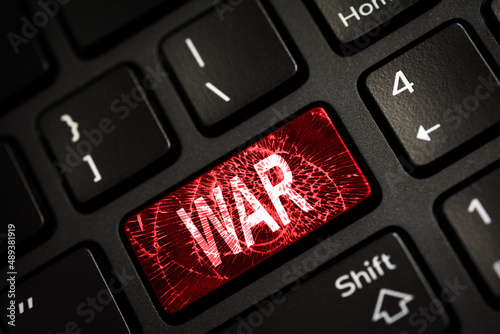 Message on broken red enter key of keyboard. Computer Ukraine war attack warning. Copy space