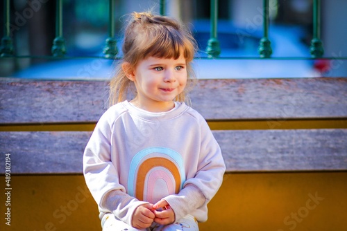portrait of a little child on the playground in lisbon portugal 