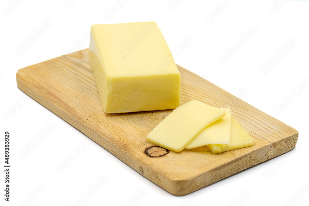 Kashar cheese or kashkaval cheese on white background. Sliced Cheddar Cheese