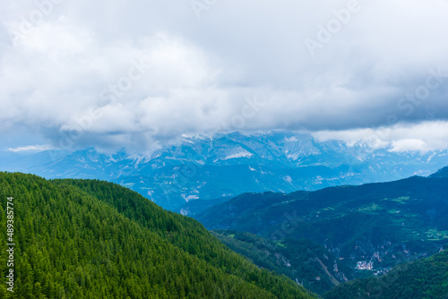 A picturesque landscape view of the French Alps mountains on a cloudy summer day (Valberg, Alpes-Maritimes, France)