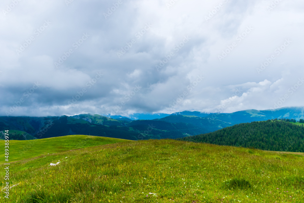 A picturesque landscape view of the French Alps mountains on a cloudy summer day (Valberg, Alpes-Maritimes, France) A picturesque landscape view of the French Alps mountains on a cloudy summer day (Valberg, Alpes-Maritimes, France)