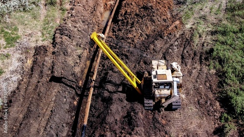 Pipeline construction. Construction equipment lays pipes. © 63ru78