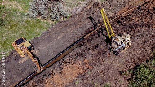 Pipeline construction. Construction equipment lays pipes.