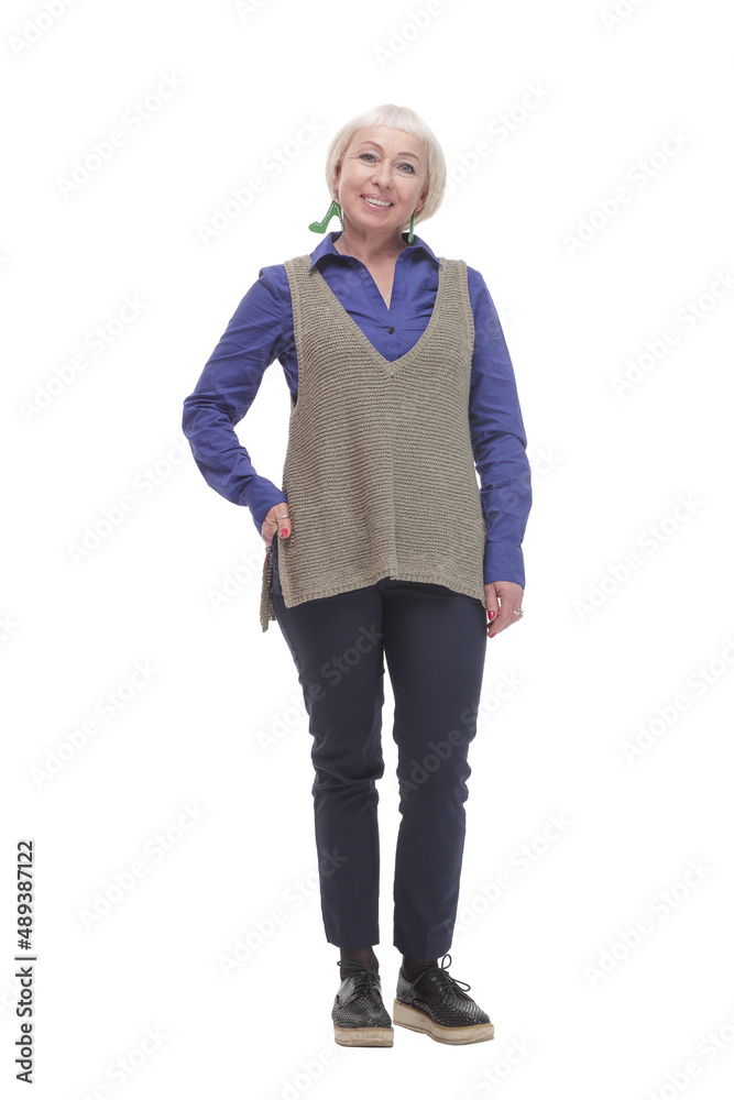 in full growth. attractive Mature woman in a gray vest. in full growth. attractive Mature woman in a gray vest.
