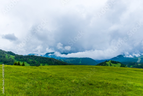A picturesque landscape view of the French Alps mountains on a cloudy summer day (Valberg, Alpes-Maritimes, France)