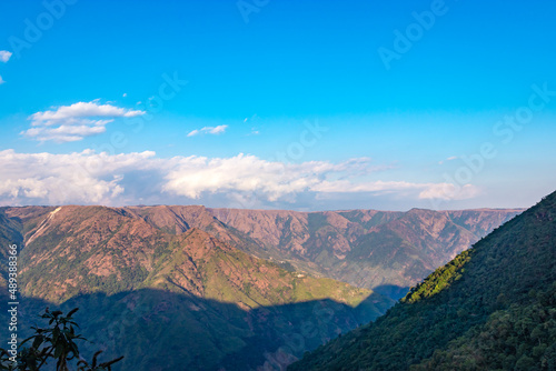 mountain range covered with bright blue sky at afternoon from different angle © explorewithinfo