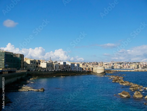 view of the city of Syracuse and the coast of the Ionian Sea on a sunny day in Sicily