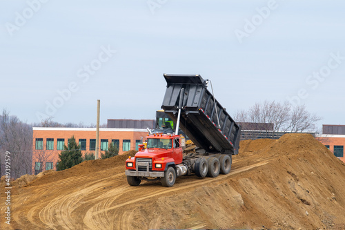 big dump truck sand unloading heavy red hydraulic