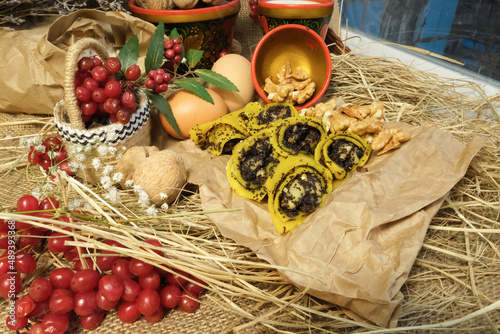 фотографія Pancakes, traditional Ukrainian slapjack with poppy seeds and walnuts