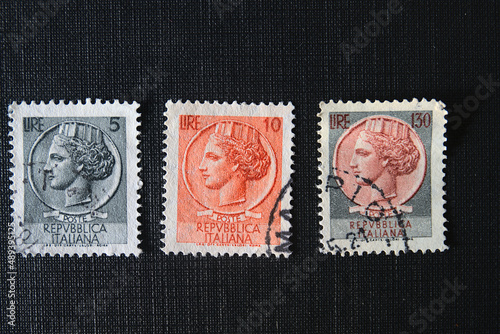 Prague, Czech Republic - February 25 2022: Vintage Italian Postage stamps, shows Coin of Syracuse, Italian lira, serie, circa 1966