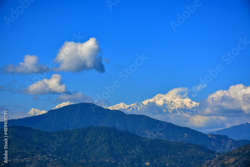 Mountain ridges in the clouds with Mt. Kanchanjunga range