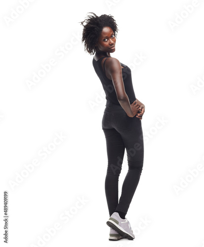 Showing off her summer body. A gorgeous young woman posing against a white background.