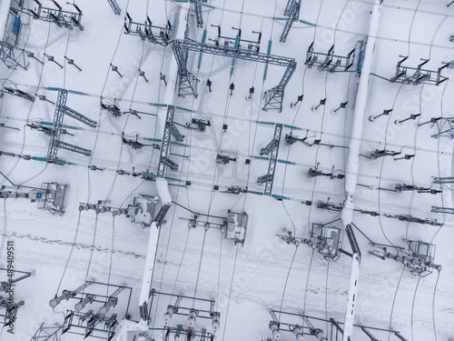 Aerial view of a high voltage electrical substation in winter season. © Viktor Kulikov