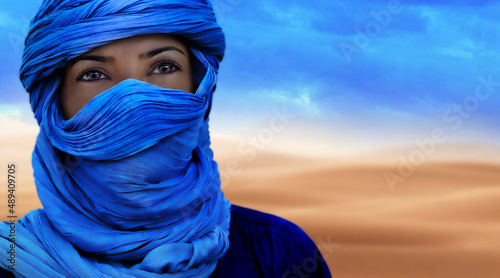 Tuareg woman in the desert photo