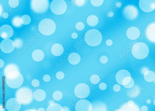 Abstract light blue background with small e big white bubbles. 