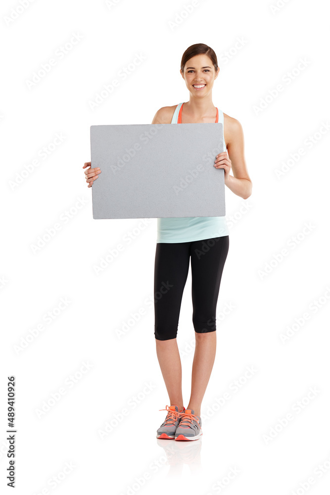 Score yourself a healthier body. Shot of a fit young woman isolated on white. Score yourself a healthier body. Shot of a fit young woman isolated on white.