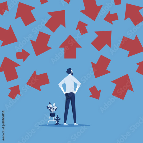 businessman looks at many arrows and selects the path, left, right or move forward, choose the right way to success concept