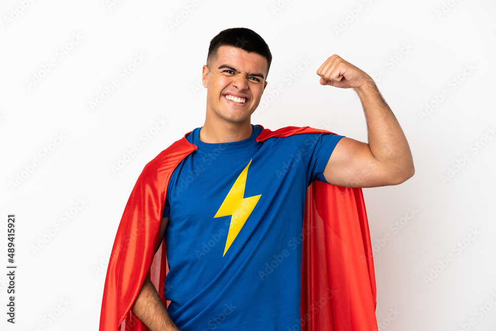 Super Hero over isolated white background doing strong gesture Super Hero over isolated white background doing strong gesture