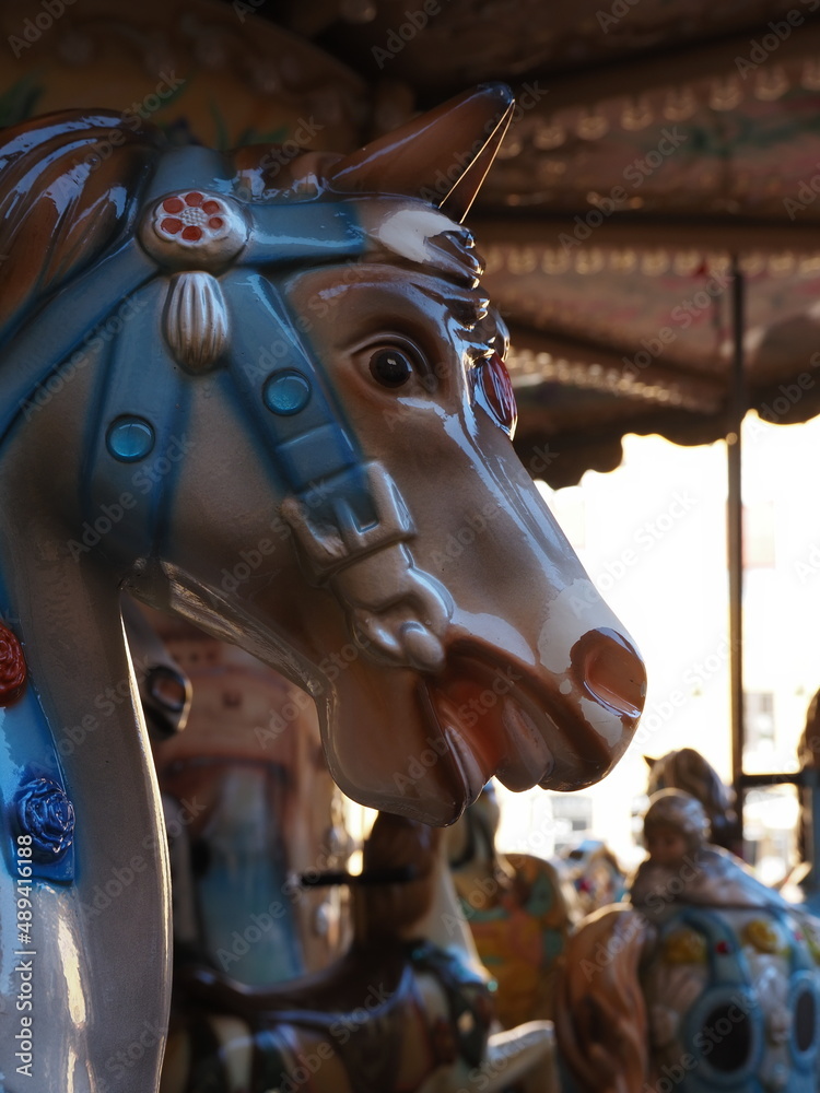 Carousel with horses, detail.
