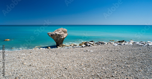 Roseto Capo Spulico, Cosenza district, Calabria, Italy, Europe, the beach under the castle characterized by a rock in the shape of an anvil photo