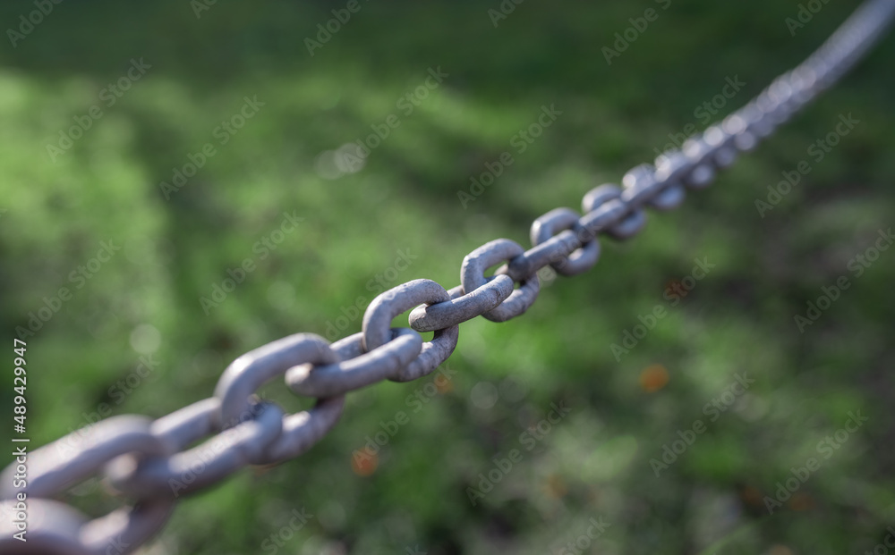 Old rusty metal steel chain links segment background. Old rusty metal steel chain links segment background.