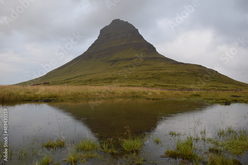 Reflection of a mountain in a raining lake