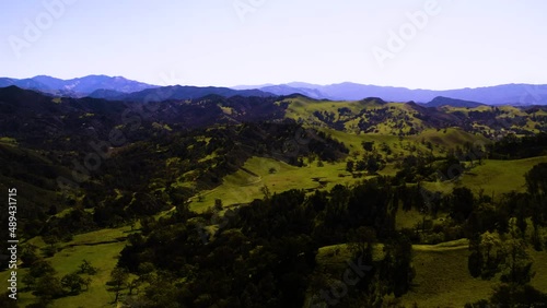 A collection of drone shots revealing incredible natural California landscapes, featuring vast lush views of green rolling hills, oak trees, and beautiful ranch land.