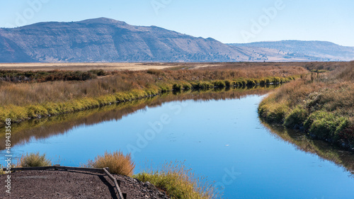 Картината върху платно Irrigation canal with water in dry climate