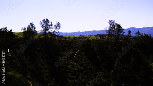 A collection of drone shots revealing incredible natural California landscapes, featuring vast lush views of green rolling hills, oak trees, and beautiful ranch land.