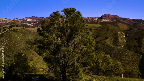 A collection of drone shots revealing incredible natural California landscapes, featuring vast lush views of green rolling hills, oak trees, and beautiful ranch land.