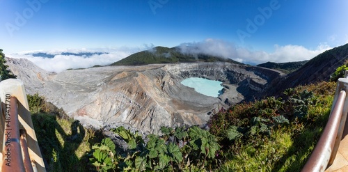 Volcano Poas with Turquoise crater lake in the rainforest of Costa Rica photo