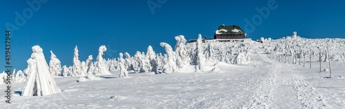 Beautiful winter panorama with shelter  Karkonosze mountains