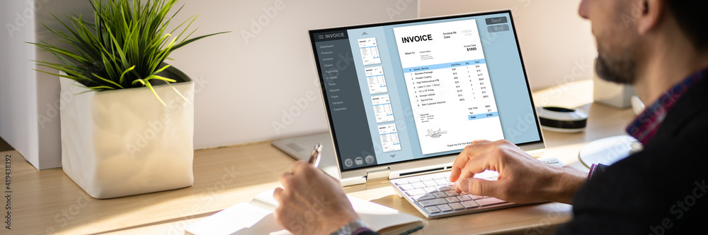 Accountant Using Online E Invoice Software Accountant Using Online E Invoice Software