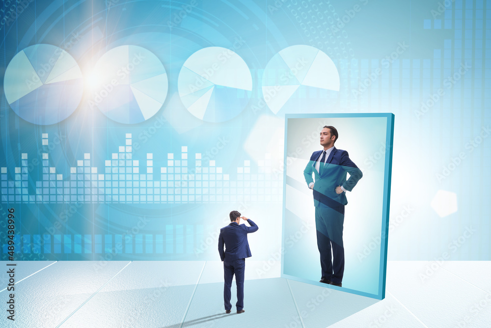 Young businessman in alter ego concept Young businessman in alter ego concept
