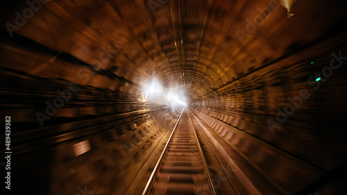 Metro subway tunnel with motion blur  view inside locomotive