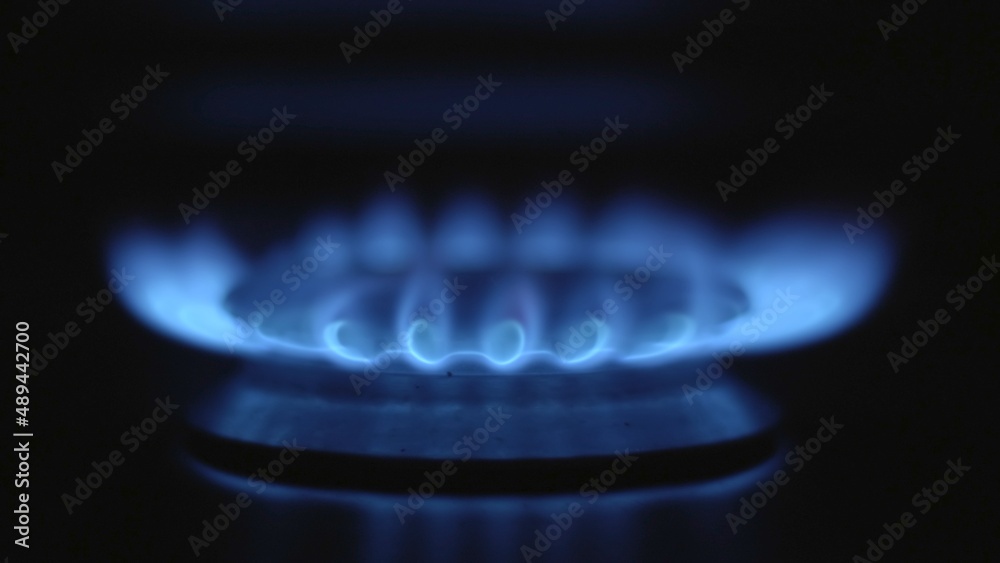 close-up of a methane gas stove that slowly goes out in the dark close-up of a methane gas stove that slowly goes out in the dark